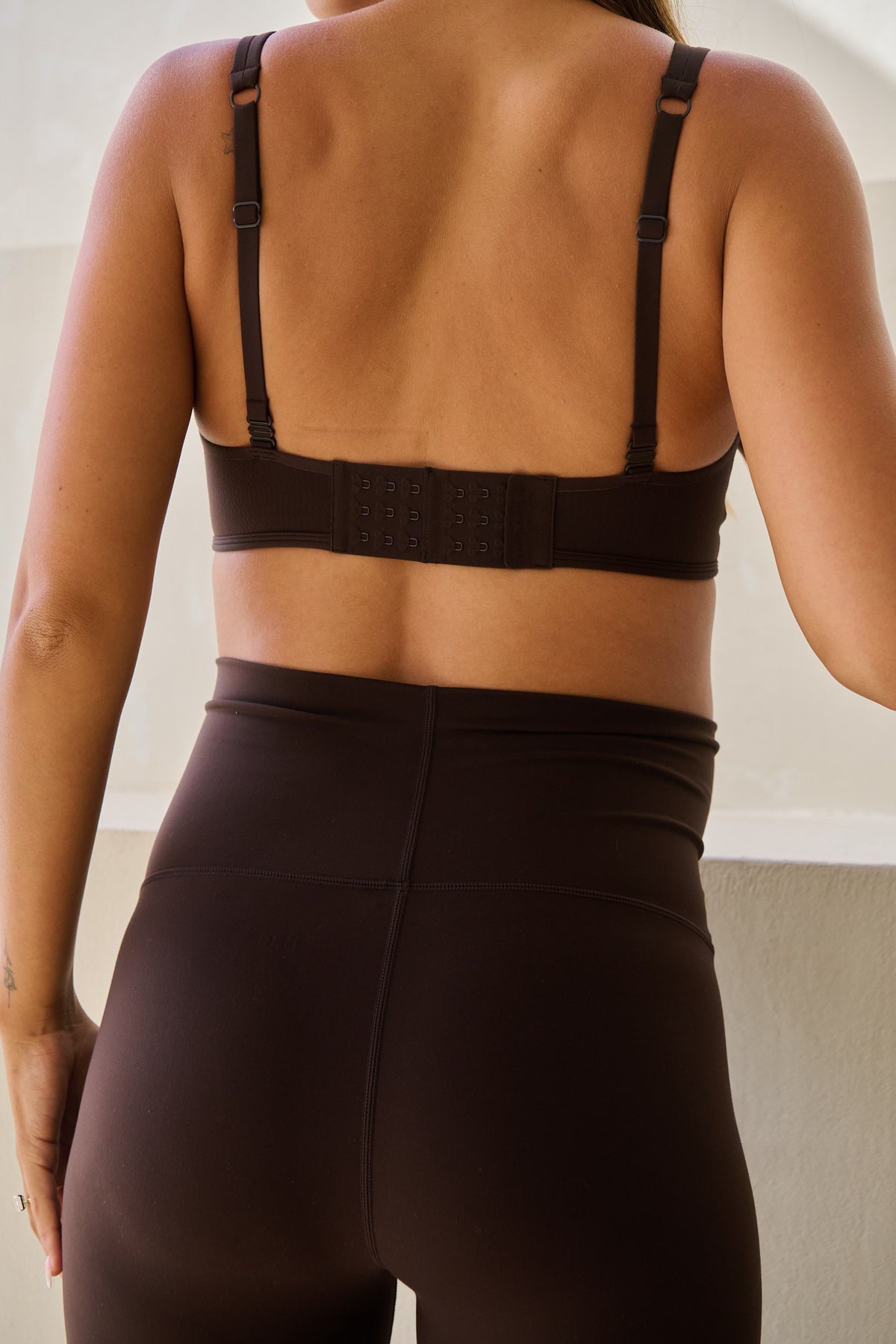 Nursing sports bra in brown – back view showing adjustable straps
