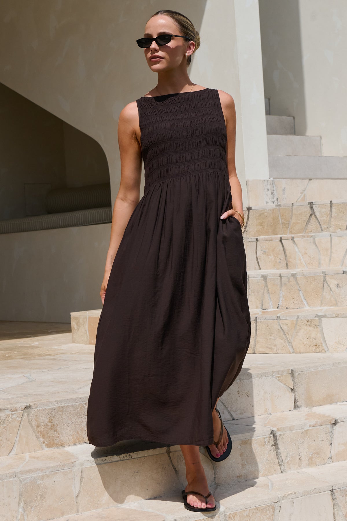 Maternity maxi dress in brown – full length walking, styled with flat sandals