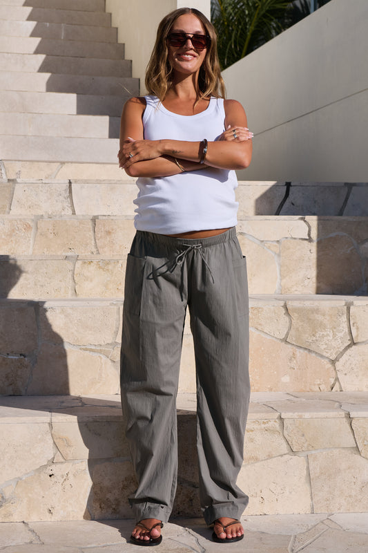 Maternity barrel pants in khaki – front view with white tank