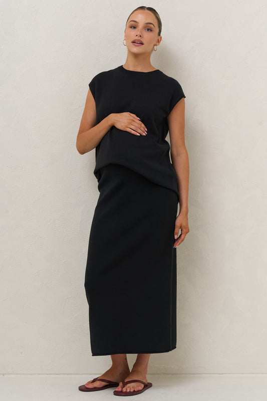 Maternity knit tank in black – styled with the matching black knit midi skirt